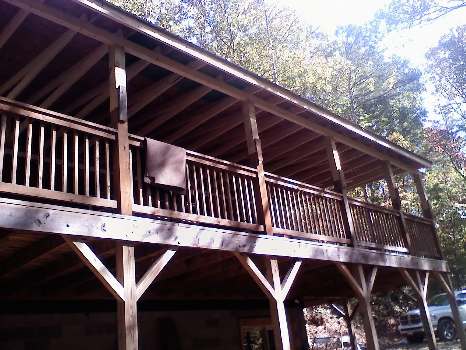 Timber framing under a new elevated porch and deck — Roof Leak Repair in Sandpoint by Roofing Brothers